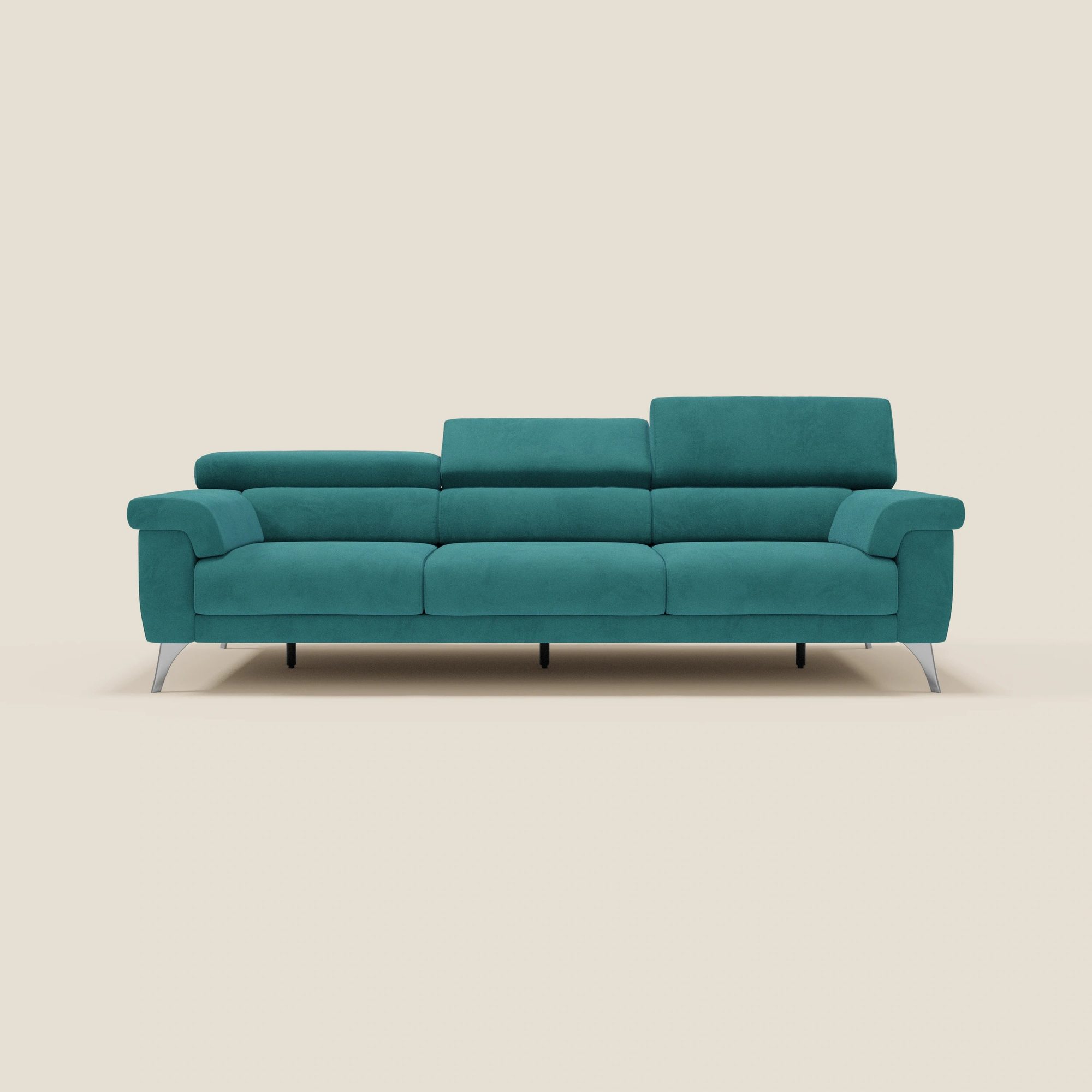 Dreiersitzer Sofa in Petrolblau mit Kopfstützen und metallischen Beinen vor beigem Untergrund