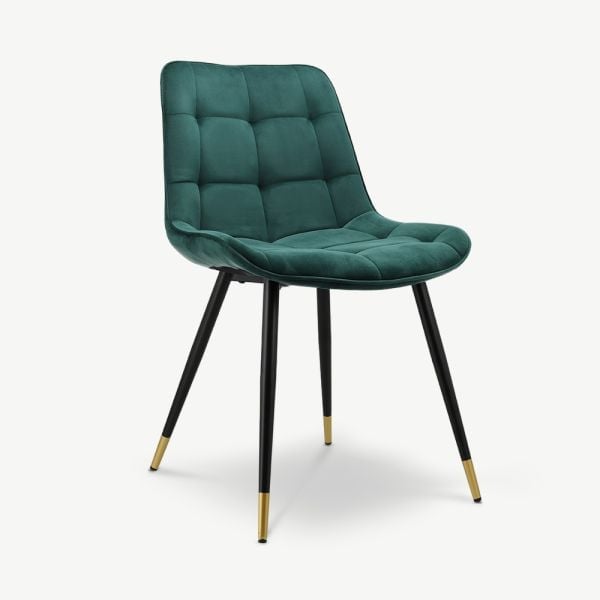 Teal green quilted dining chair with black legs and brass-tipped feet